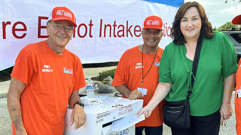 State Rep Christine Hunschofsky and poll deputies during early voting. {courtesy}