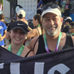 Battling Cancer With Grit: Commissioner John Brodie Runs 5K During Chemotherapy, Carries Flags of Hope and Service